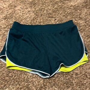 Size M Brooks running shorts with bikers shorts underneath